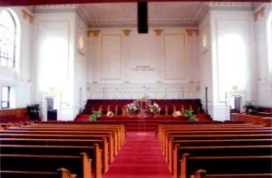 After - View of the new pulpit, pews and painting