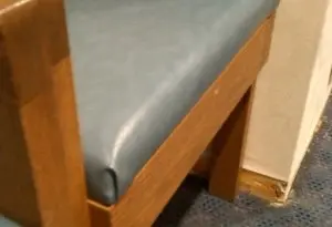 Before chair was reupholstered