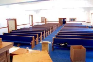 After - Shot of New Pews and New Carpet