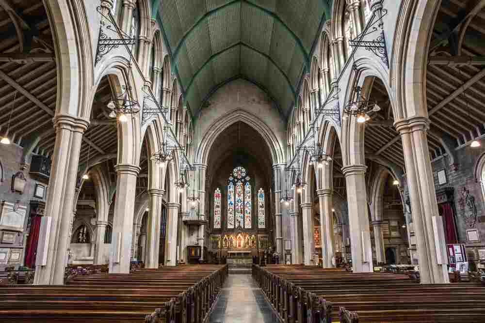 inside-view-church-with-religious-icons-windows-stone-arches