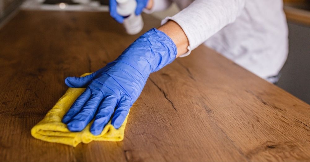 polishing wooden pews