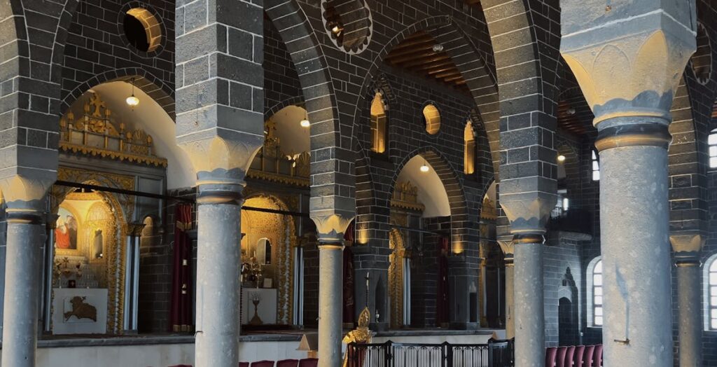 Explore a beautiful historic church interior featuring stone arches and elegant architecture.