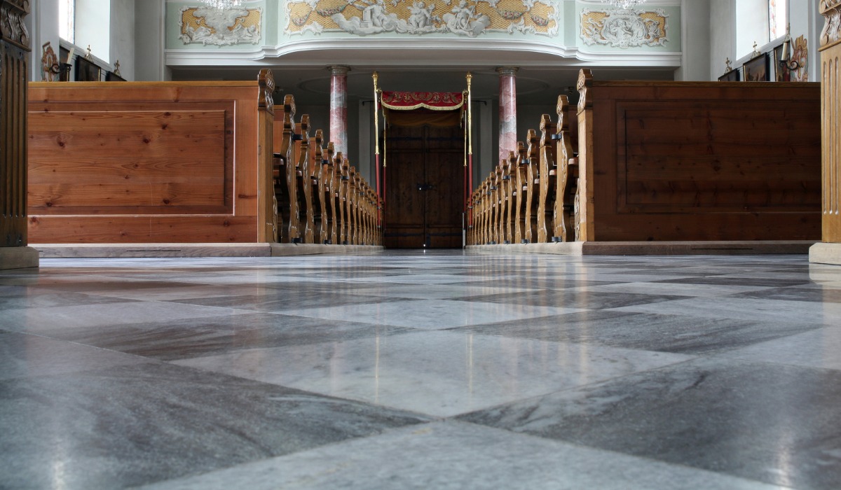 polished grey and white marble checkered tiled floor