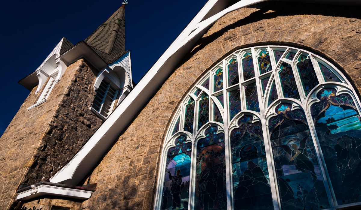 featuring a large stained-glass window