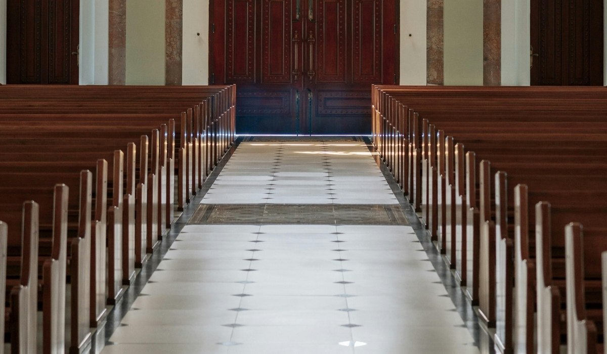 aisle of white-tiled flooring